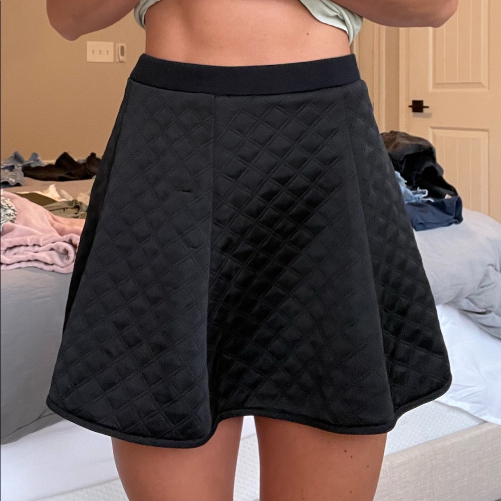 Quilted black mini skirt